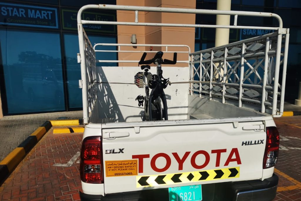 Office moving pickup trucks transporting office furniture safely